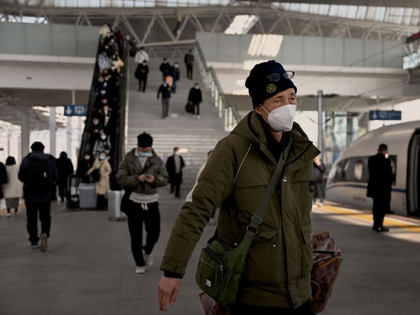 This picture taken on Jan 5, 2023 shows a man wearing a face mask amid the Covid-19 pandemic arriving at a train station in Bengbu, east China's Anhui Province. Exhausted doctors working overtime, tests and treatments nowhere to be found, and under-resourced clinics inundated with patients — in Anhui, one of east China's poorest provinces, Covid hit hard.
This picture taken on Jan 5, 2023 shows a man wearing a face mask amid the Covid-19 pandemic arriving at a train station in Bengbu, east China's Anhui Province. Exhausted doctors working overtime, tests and treatments nowhere to be found, and under-resourced clinics inundated with patients — in Anhui, one of east China's poorest provinces, Covid hit hard.