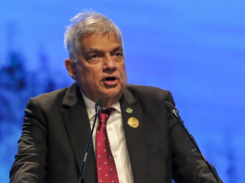 Sri Lanka's President Ranil Wickremesinghe delivers a speech at the leaders summit of the COP27 climate conference at the Sharm el-Sheikh International Convention Centre, in Egypt's Red Sea resort city of the same name, on Nov 8, 2022.
Sri Lanka's President Ranil Wickremesinghe delivers a speech at the leaders summit of the COP27 climate conference at the Sharm el-Sheikh International Convention Centre, in Egypt's Red Sea resort city of the same name, on Nov 8, 2022.