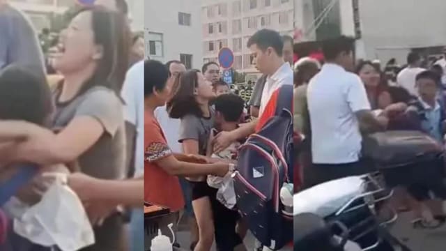 中国离婚夫妻校门口争抢孩子 孩子吓得嚎啕大哭