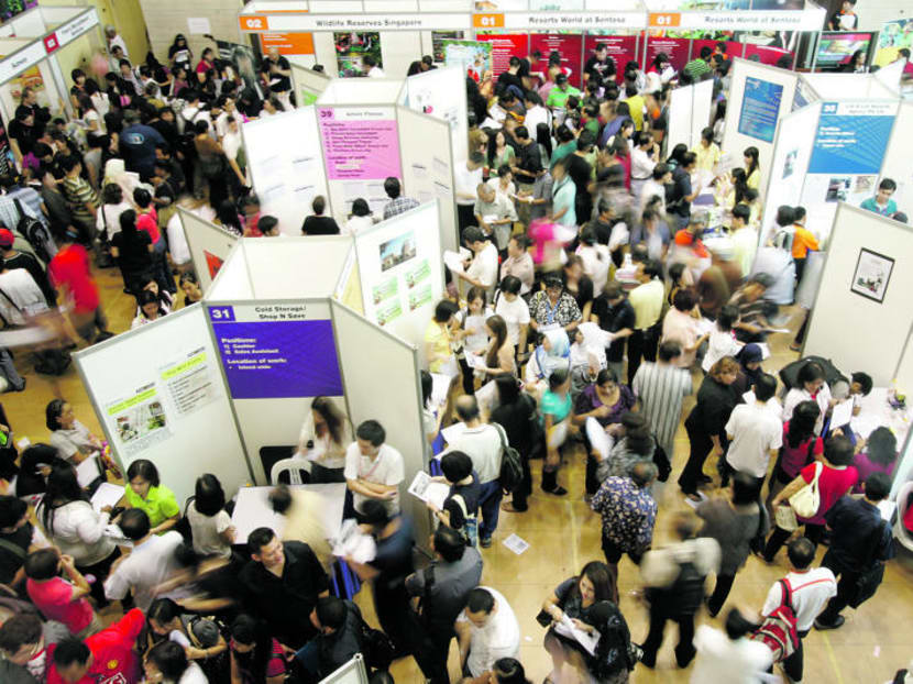 Job seekers at a job fair. TODAY file photo