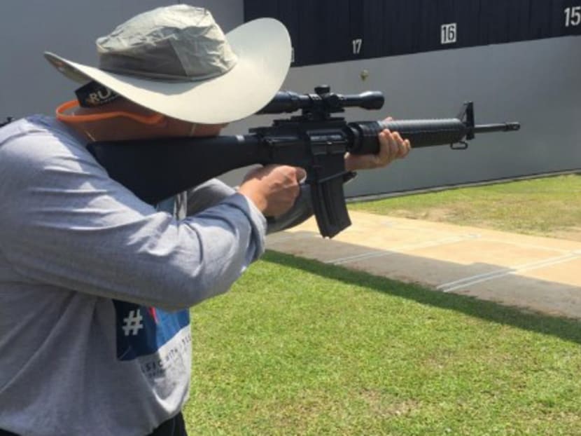 A member from a local gun club practising with his rifle at the National Shooting Centre. Due to security concerns, Singapore Police has ordered some 70 weapons from armouries at National Shooting Centre to be destroyed or exported.
