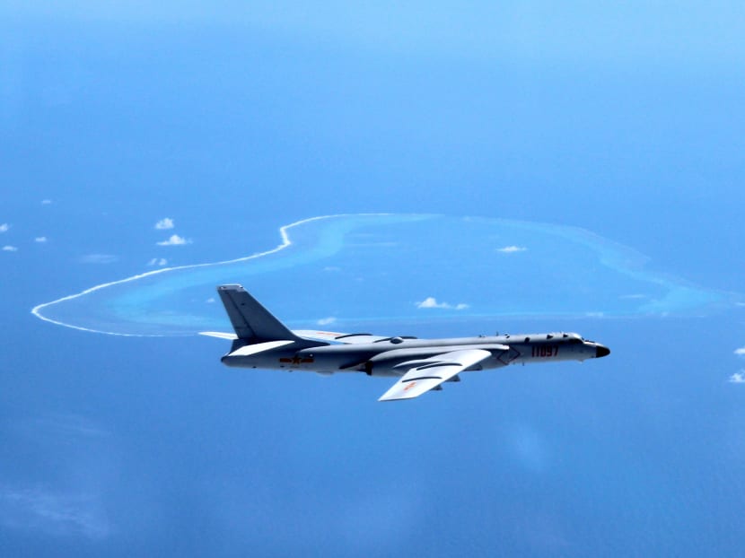 Undated photo of a Chinese H-6K bomber patrolling islands and reefs including Huangyan Dao in the South China Sea. Photo: XINHUA via AP