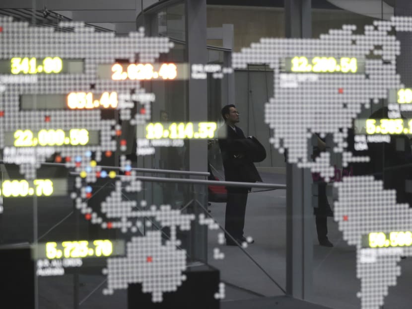 A board showing benchmark indexes of the global markets during the opening of the 2017 trading year. Financial markets had quite a mixed start to the New Year. Photo: AP