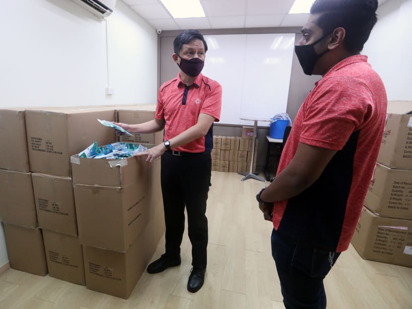Trade and Industry Minister Chan Chun Sing (left) said that the general public should wear reusable masks instead of surgical masks, which should be conserved for healthcare workers. Trade and Industry Minister Chan Chun Sing (left) said that the general public should wear reusable masks instead of surgical masks, which should be conserved for healthcare workers.