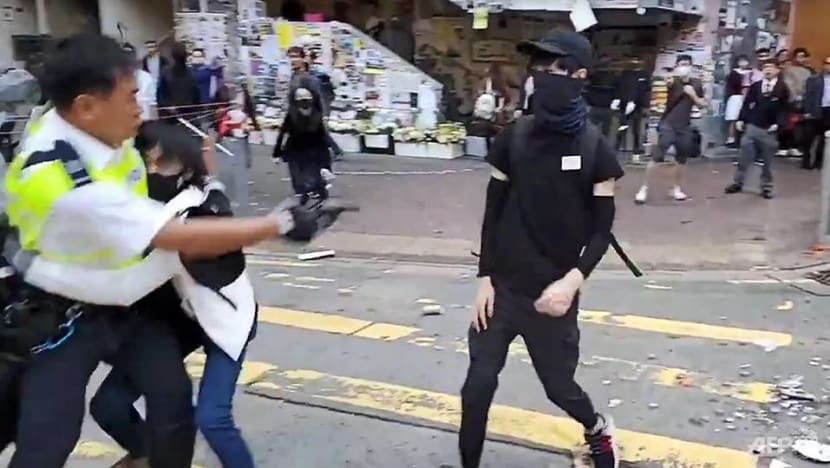 Protesters tried to steal officer's gun: Hong Kong police on latest shooting Protesters tried to steal officer's gun: Hong Kong police on latest shooting