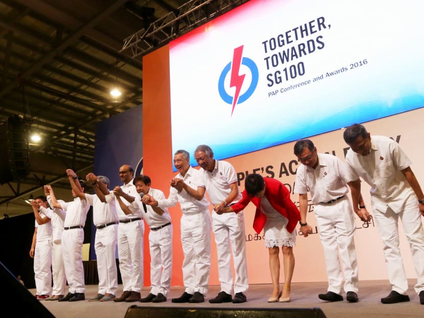 The newly elected Central Executive Committee members taking a bow at the finale of the 34th PAP Conference yesterday. Photo: Ooi Boon Keong