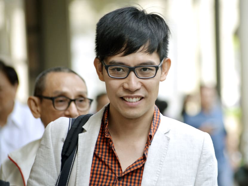 Roy Ngerng (white jacket) leaving the Supreme Court, on July 3, 2015. Photo: Robin Choo