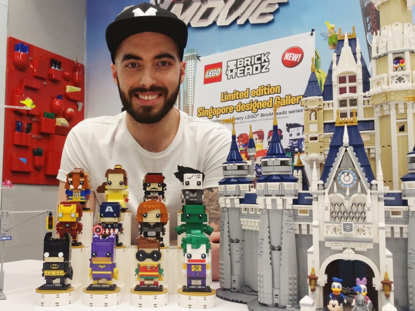 Marcos Bessa and his creations: (from left) the Ghostbusters firehouse set, the BrickHeadz collection, and the Disney castle set. Photo: Christopher Toh