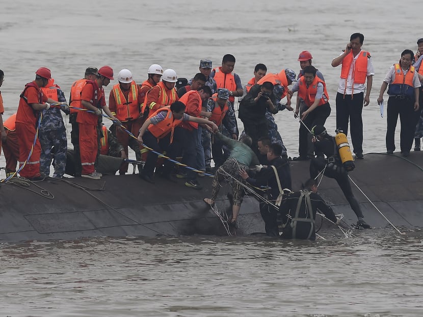 More than 400 still missing from capsized cruise ship in China