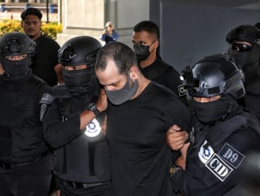Israeli national Shalom Avitan was charged with trafficking six firearms and possessing four boxes of ammunition without an arms licence at a five-star hotel room between March 26 and March 28