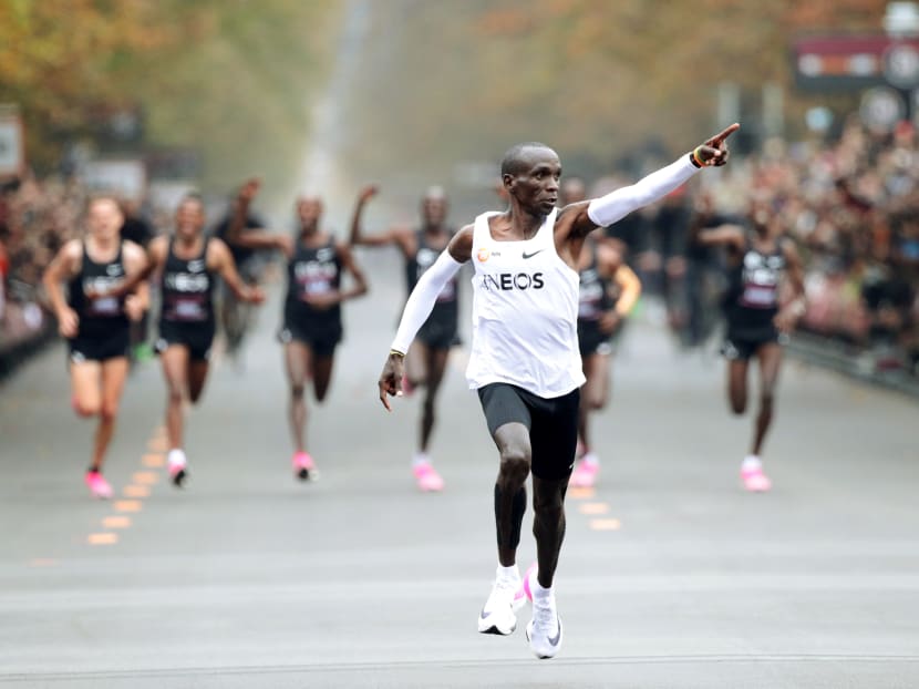 Kenya's Eliud Kipchoge, the marathon world record holder, crosses the finish line during his attempt to run a marathon in under two hours in Vienna, Austria, Oct 12, 2019.