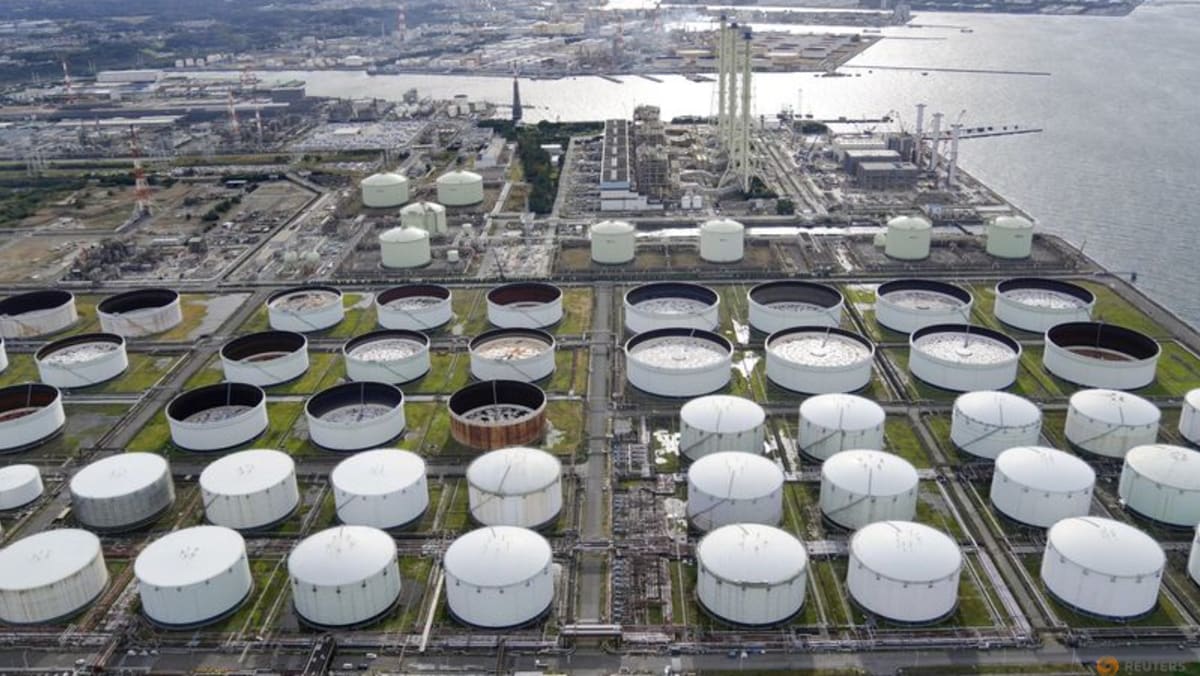 Oil edges up on US Fed rate signals, China property sector support