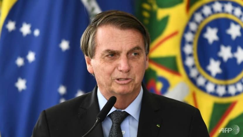 Brazil's Bolsonaro overhauls Cabinet amid COVID-19 surge