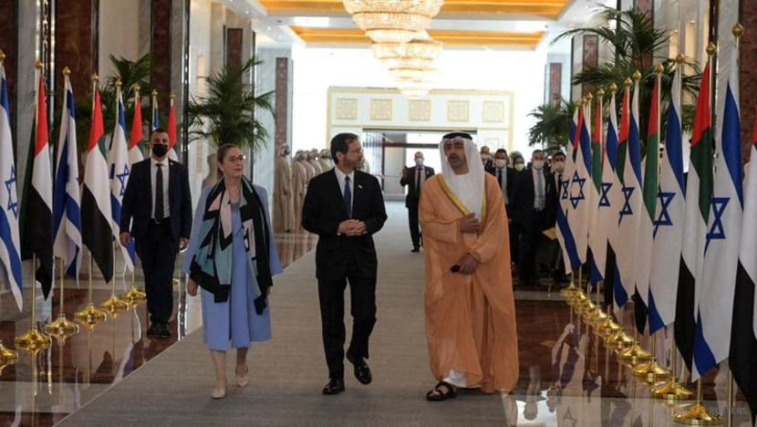UAE intercepts a Houthi missile as Israeli president visits UAE intercepts a Houthi missile as Israeli president visits