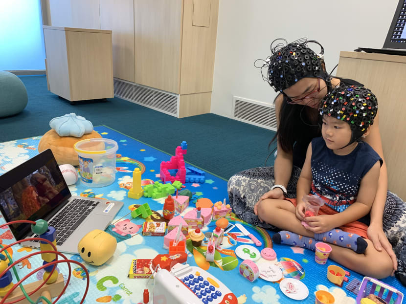 Researchers studying the impact of parental stress analysed 31 pairs of mother and child who watched animation clips together. Their brain activities were monitored using functional near-infrared spectroscopy caps — a common neuroimaging technique. Researchers studying the impact of parental stress analysed 31 pairs of mother and child who watched animation clips together. Their brain activities were monitored using functional near-infrared spectroscopy caps — a common neuroimaging technique.