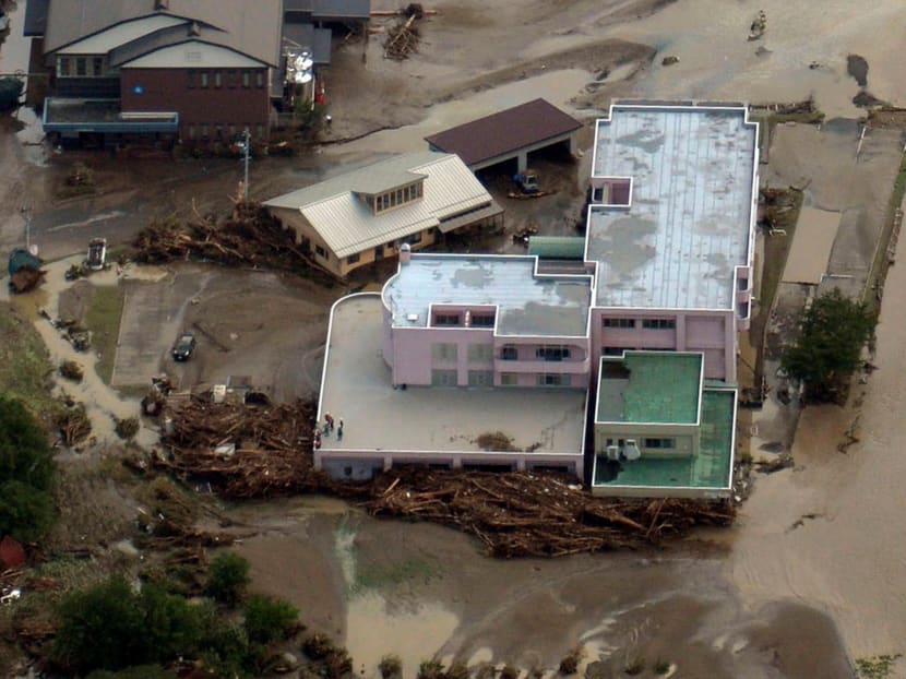 Photo shows an inundated nursing home for the elderly, where the bodies of nine people were found the same day, in Iwaizumi, Iwate Prefecture in northeastern Japan, following flooding triggered by heavy rains brought by Typhoon Lionrock. Photo: Reuters via Kyodo
