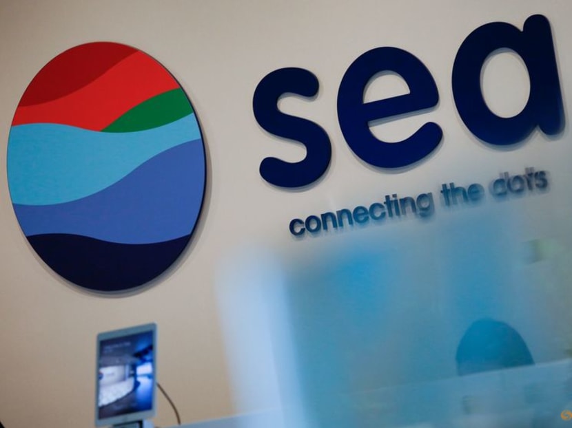 FILE PHOTO: Southeast Asian e-commerce and gaming group Sea Ltd's sign is pictured at its office in Singapore, March 5, 2021. REUTERS/Edgar Su/File Photo FILE PHOTO: Southeast Asian e-commerce and gaming group Sea Ltd's sign is pictured at its office in Singapore, March 5, 2021. REUTERS/Edgar Su/File Photo
