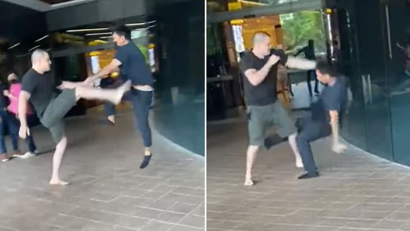 Two men caught on video fighting outside Great World arrested for affray Two men caught on video fighting outside Great World arrested for affray