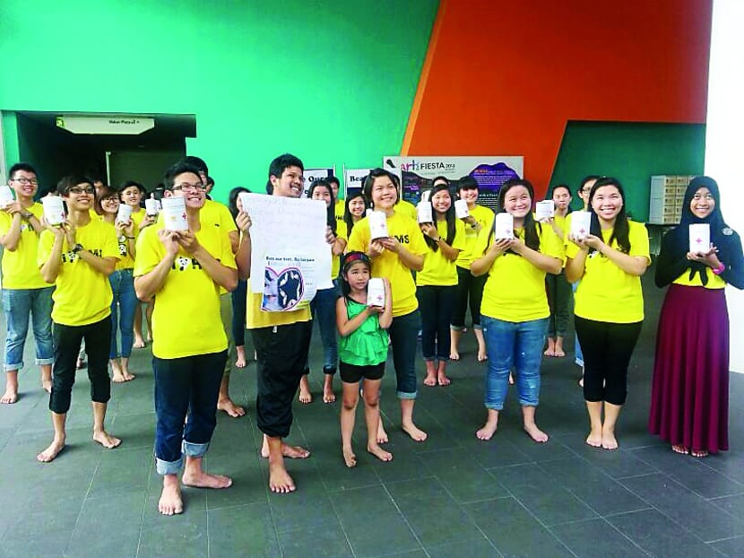 Ngee Ann Polytechnic students and staff went barefoot to raise funds for typhoon relief efforts last month, as part of Bare Our Feet, Bear Their Pain. Photo: Ngee Ann Polytechnic