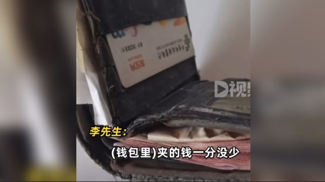 中国男子遗失钱包 十年后找回竟一分不少