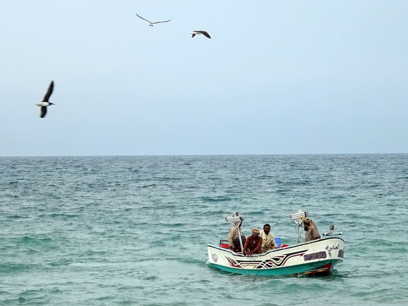 Yemeni fishermen return to the shore off the coast of in the Yemeni Red Sea city of Hudeida on Feb 21, 2021.