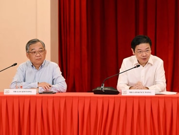 Trade and Industry Minister Gan Kim Yong (left) and Deputy Prime Minister Lawrence Wong at a press conference at the Istana on May 13, 2024.