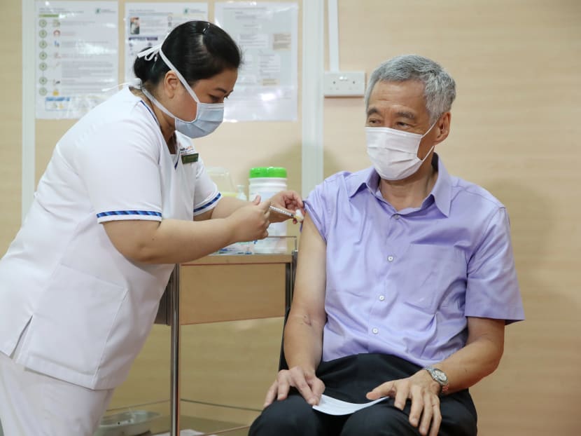 Prime Minister Lee Hsien Loong receives his first Covid-19 vaccination at the Singapore General Hospital on Jan 8, 2021.