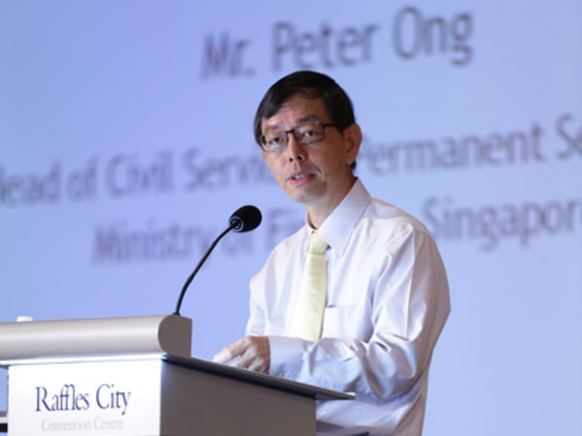 Mr Peter Ong, Head of Civil Service, gives an opening address at the behavioural economics conference organised by the Civil Service College, National University of Singapore and University of Southern California on June 25, 2015. Photo: Civil Service College