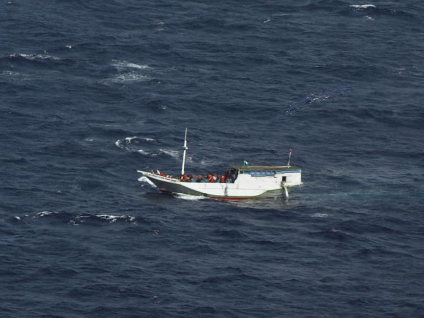 In this handout file photo released by the Indonesian National Search and Rescue Agency (Basarnas) on July 4, 2012 and taken from an Indonesian Air Force aircraft shows a boat believed to be carrying up to 180 asylum-seekers spotted off Indonesia about 50 nautical miles south of Java island and sailing towards Australian waters. Photo: Basarnas/AFP