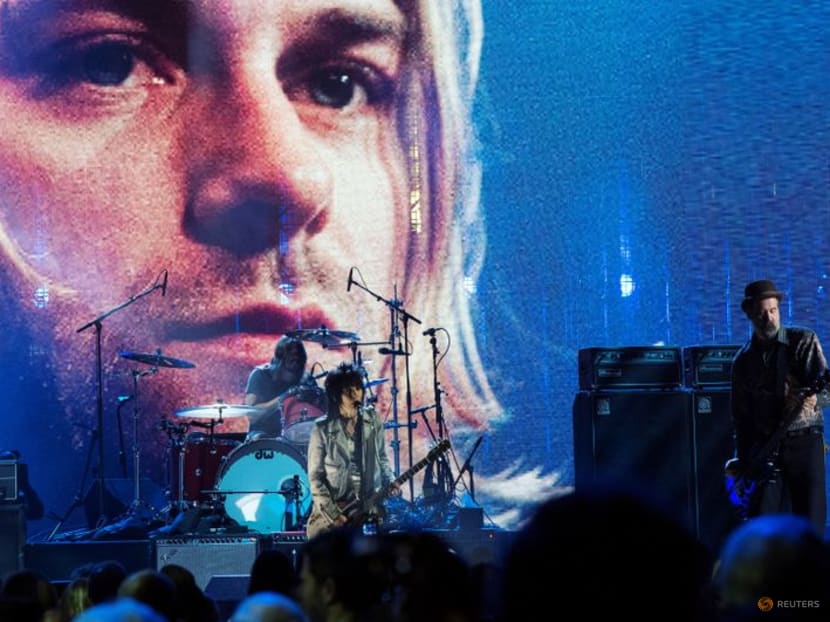 Man photographed as naked baby on Nirvana album cover sues for sexual exploitation Man photographed as naked baby on Nirvana album cover sues for sexual exploitation