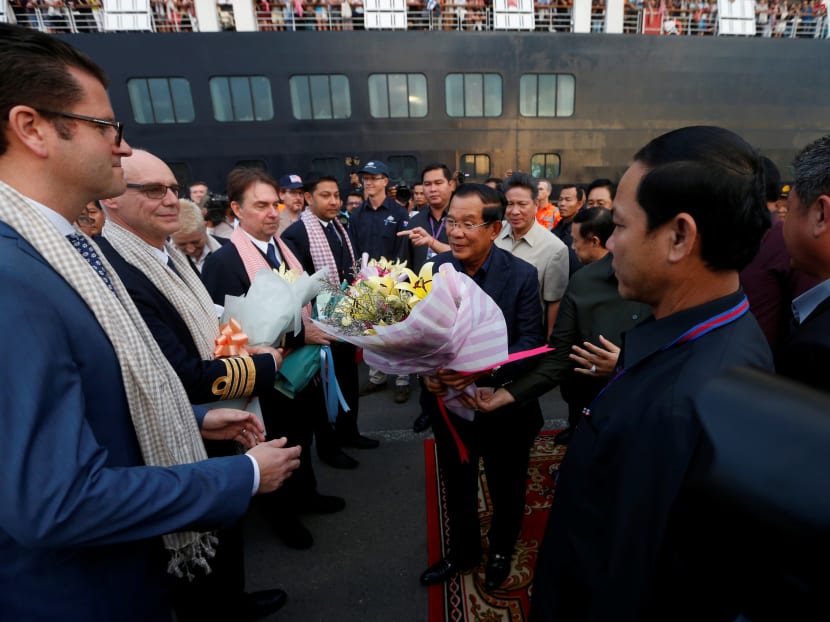 Cambodia's Prime Minister Hun Sen welcomes the passengers and crews of MS Westerdam as it docks in Sihanoukville, Cambodia, Feb 14, 2020.