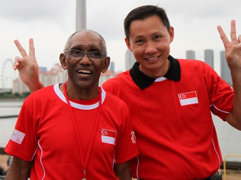 Former national shuttler Donald Koh (photo, right) with athletics legend C Kunalan at the Singapore Sports Hub Community Open House. Photo by Sport Singapore/ Dyan Tjhia