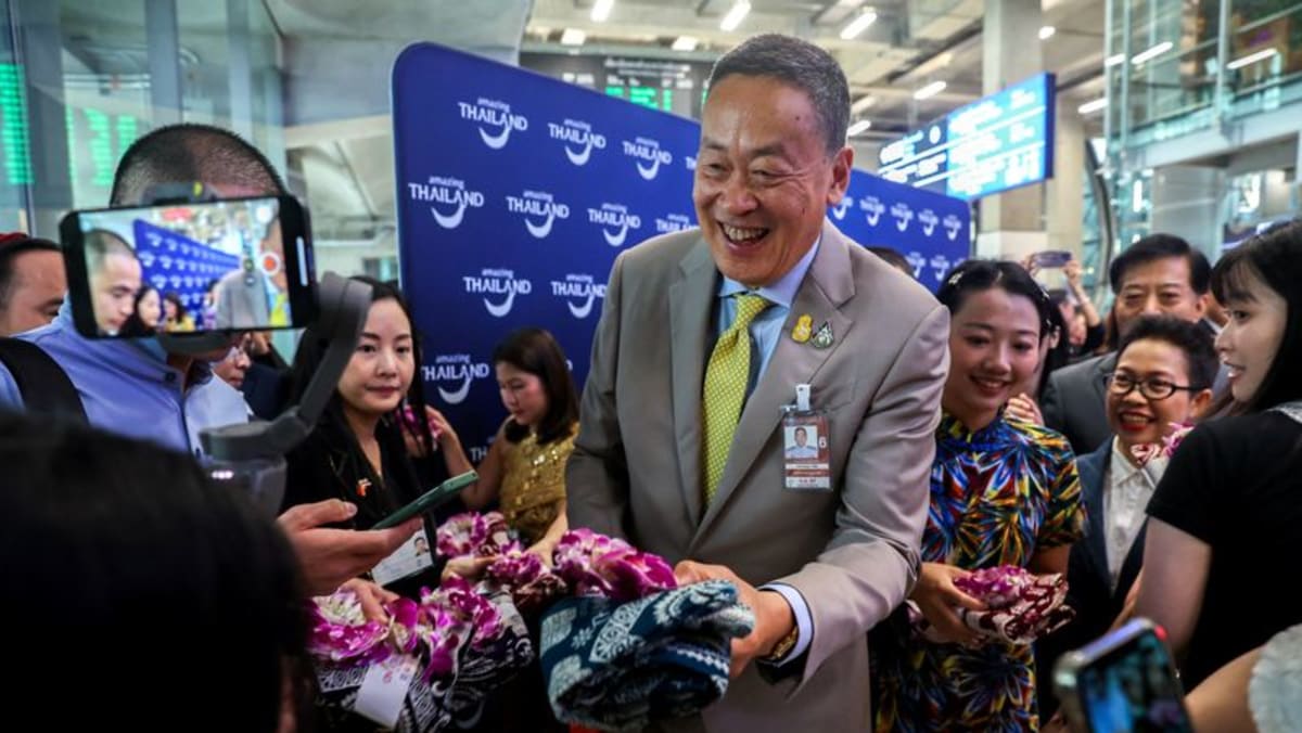 Chinese tourists get VIP welcome as Thai visa waiver programme begins