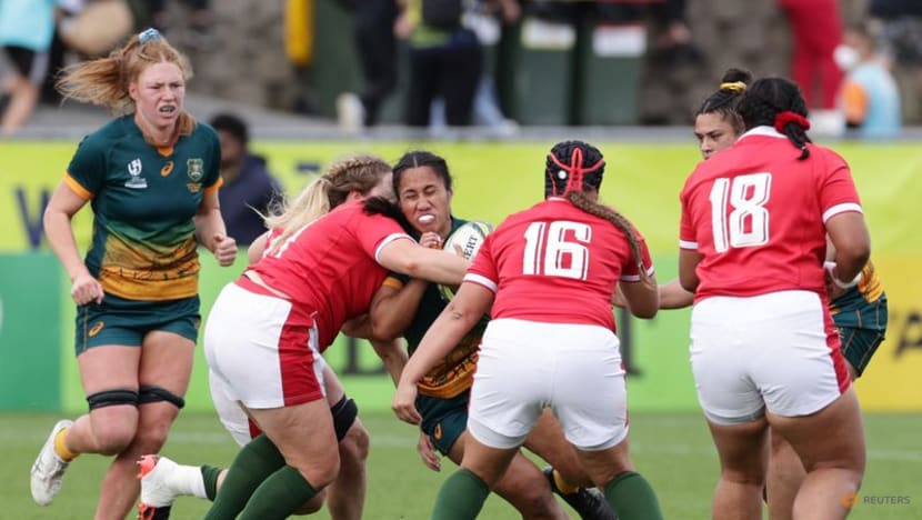 Rugby-Australia advance to quarters with narrow win over Wales, NZ thrash Scotland Rugby-Australia advance to quarters with narrow win over Wales, NZ thrash Scotland