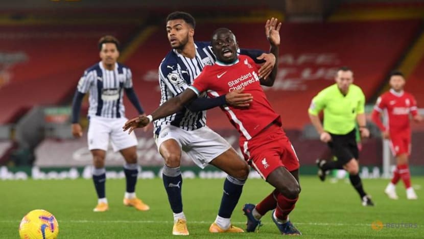 Liverpool miss chance to stretch lead, Tottenham held at Wolves Liverpool miss chance to stretch lead, Tottenham held at Wolves
