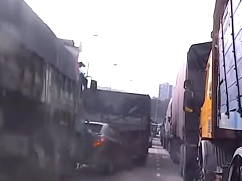 A screenshot of a video showing a lorry hitting a second car along the Causeway on Oct 13, 2022.