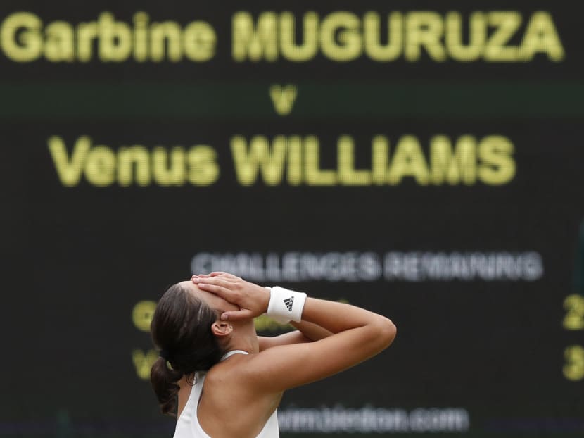 Muguruza's the pride of Spain as she powers past Venus for first