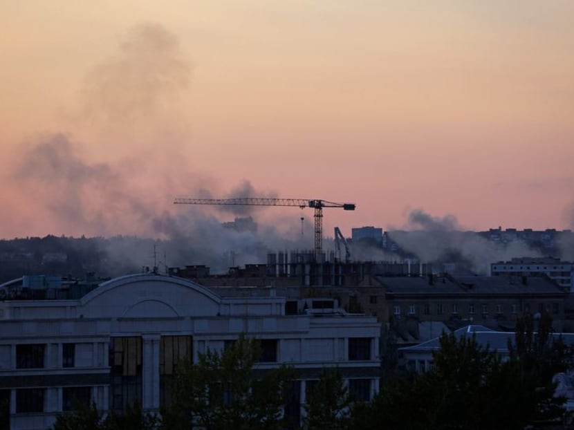 FILE PHOTO: Smoke rises above buildings following a shelling in the course of Russia-Ukraine conflict in Donetsk, Russian-controlled Ukraine, September 10, 2023. REUTERS/Alexander Ermochenko/File Photo