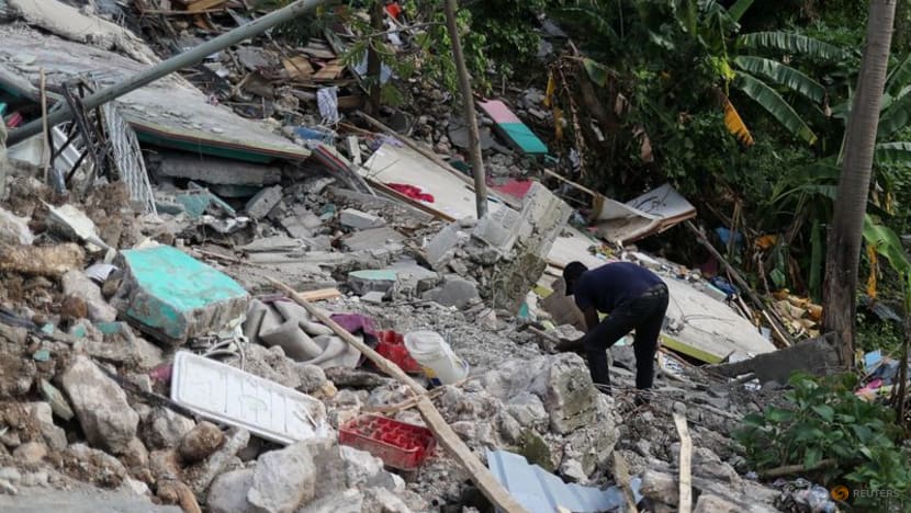 Haiti faces anger and despair a week after quake, fanning security fears Haiti faces anger and despair a week after quake, fanning security fears