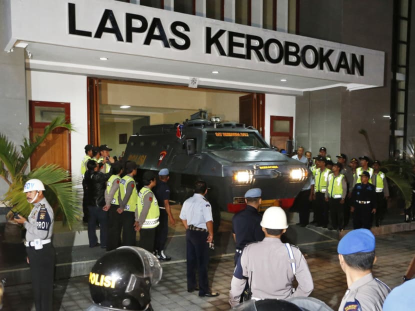 An armoured vehicle believed to be carrying death row prisoners Myuran Sukumaran and Andrew Chan, leaving Bali's Kerobokan Prison for the airport on March 4. The men will be executed on the prison island of Nusakambangan. Photo: REUTERS
