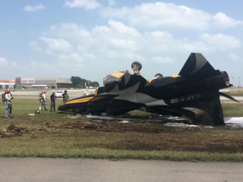 A T-50 aircraft (pictured) from the Republic of Korea Air Force's aerobatic team caught fire after it crashed into a grass verge at Changi Airport’s Runway 1 on Tuesday (Feb 6). The pilot escaped with light injuries. Photo: TODAY reader