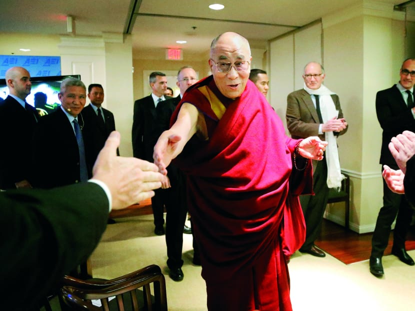 The Dalai Lama greeting the audience in Washington last year. Photo: AP