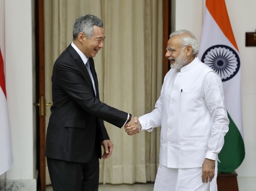 India has to develop a “stable and constructive” relationship with its neighbours, said Singapore Prime Minister Lee Hsien Loong (left) seen with Indian Prime Minister Narendra Modi. Photo: AP