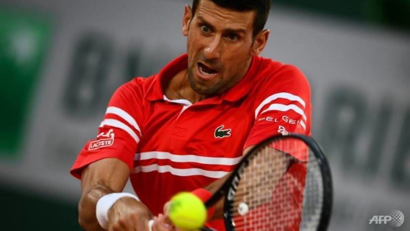 Tennis: Djokovic saunters into French Open round two Tennis: Djokovic saunters into French Open round two