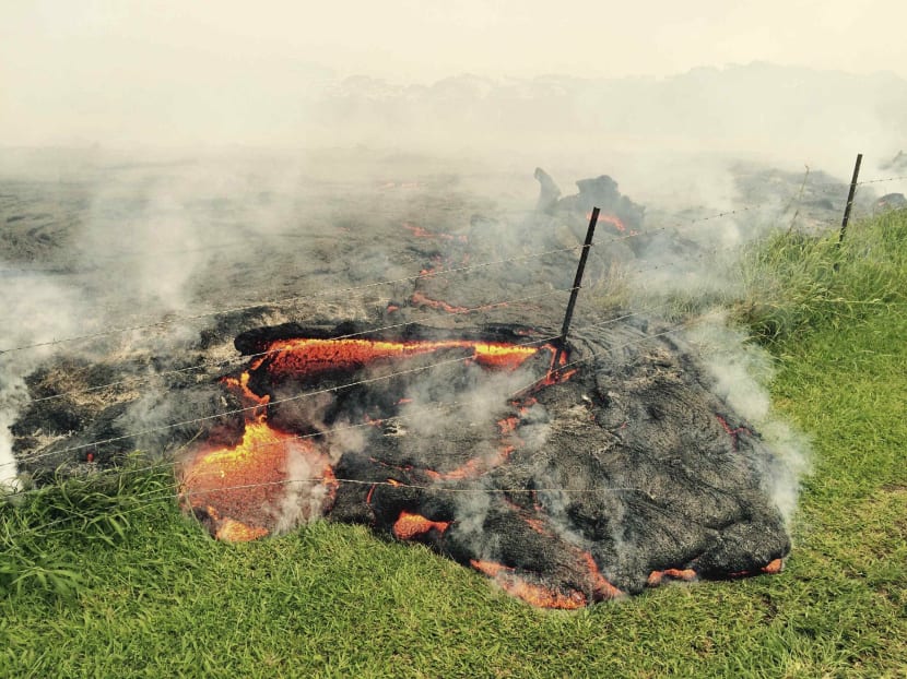 Gallery: Lava flow from Hawaii volcano crawls toward homes
