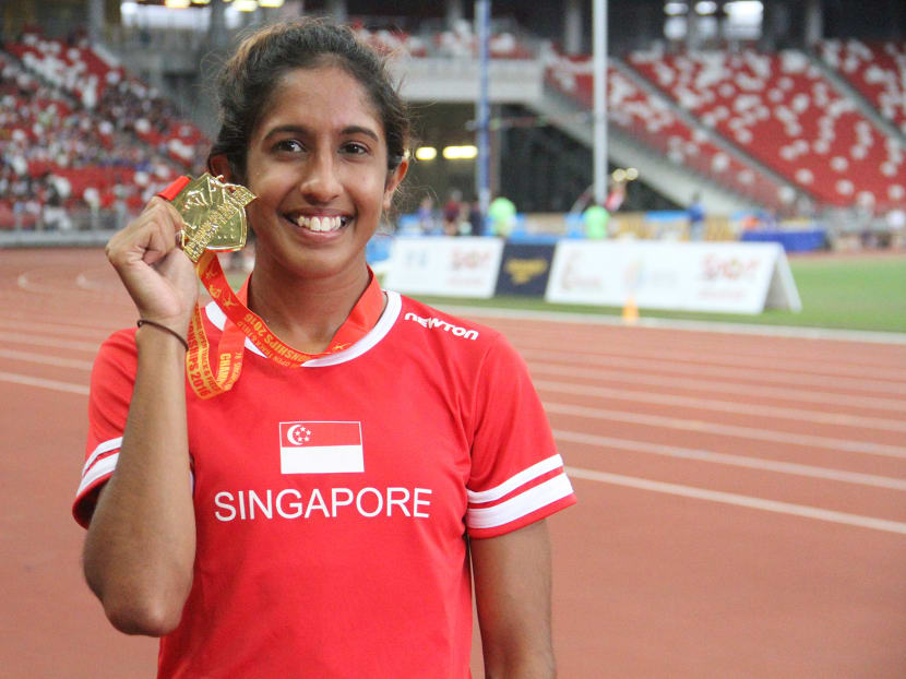 Singapore sprinter Shanti Pereira, tore up the track at the National Stadium in the women’s 200m race on April 29, 2016, and clinching the country’s first gold medal in the event since 1973. Photo: Damien Teo/TODAY