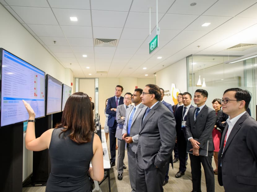 Minister of Trade and Industry (Industry) S Iswaran touring P&G’s Singapore Innovation Centre, following the launch of the P&G E-Centre — its first digital innovation hub located outside the United States. Photo: P&G