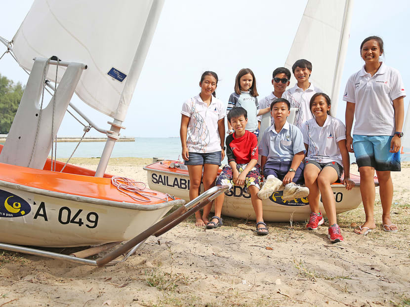 Participants in Sailability, an initiative between Fish & Co and the Singapore Sailing Federation, photographed with their mentors. Photo: Don Wong