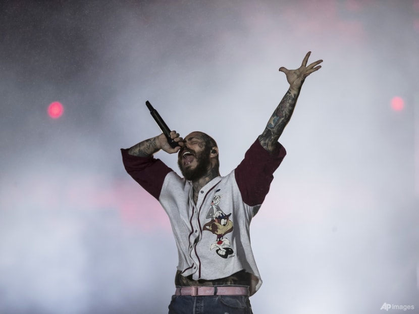 Post Malone, experiencing 'stabbing pain', postpones show Post Malone, experiencing 'stabbing pain', postpones show