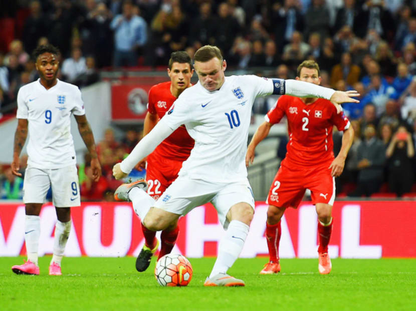 Wayne Rooney scoring England’s second from the penalty spot during their 2-0 Euro 2016 qualifying match victory over Switzerland in London last September. Photo: Getty Images